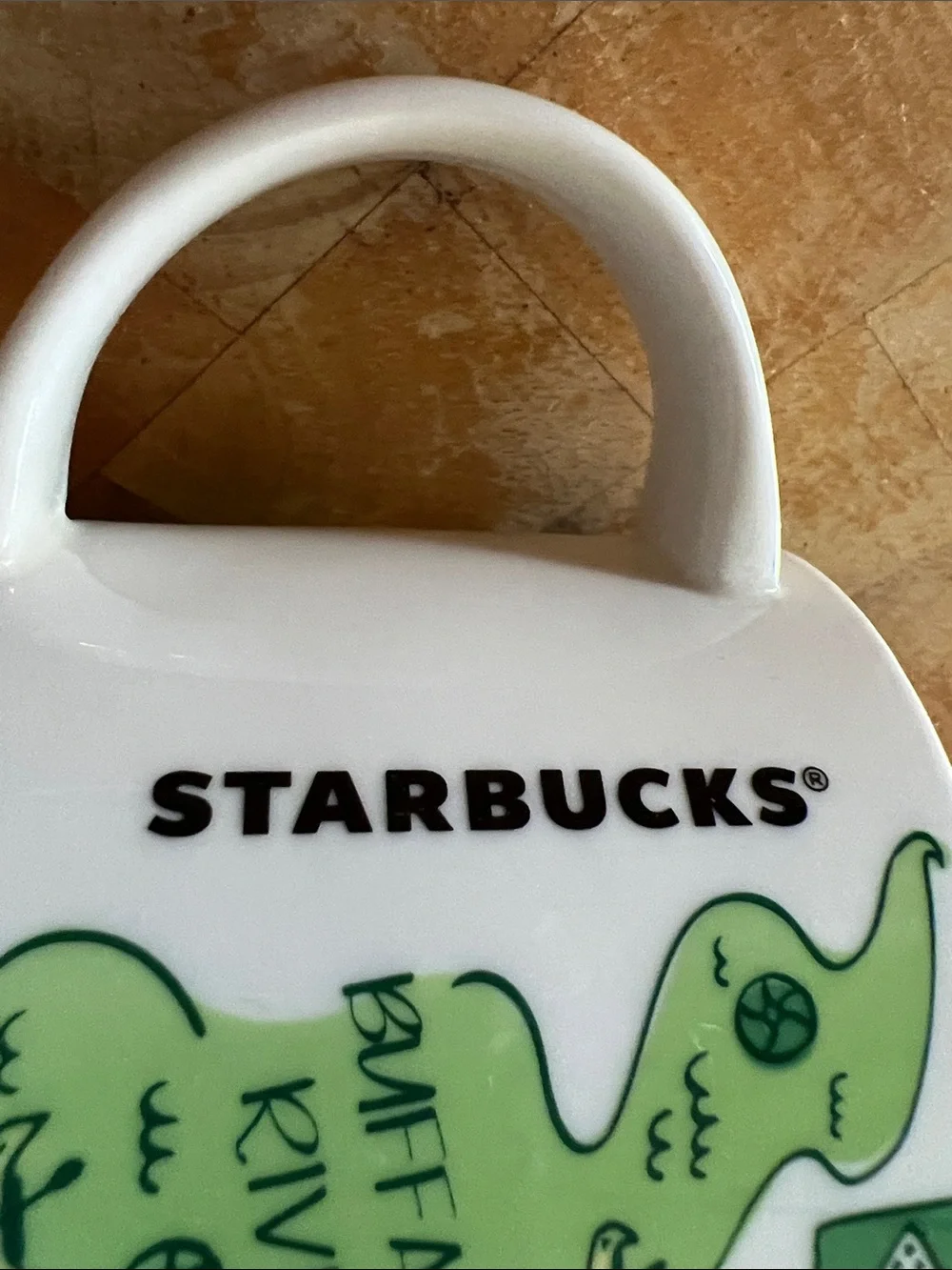 Starbucks White Arkansas Ceramic Mug with Green and Yellow Graphics